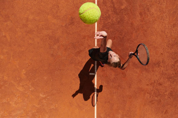 Comment le climat local influence-t-il une construction court de tennis à Genève ?